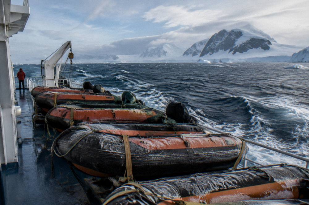 Zodiacs lined up on the deck of an expedition ship ready for shore operations