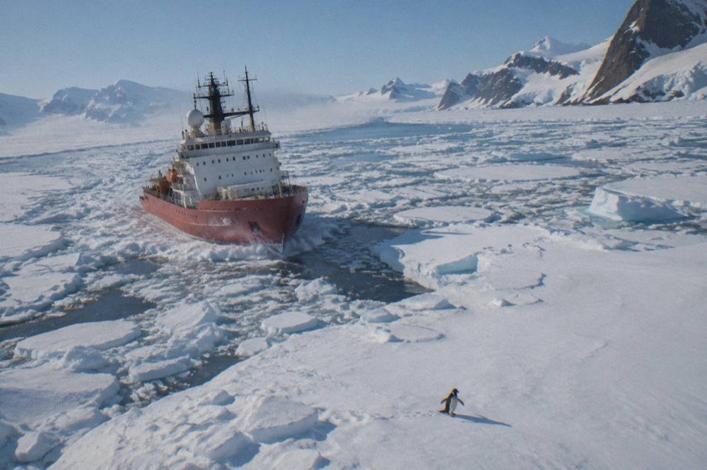 A polar icebreaker moving through pack ice in polar waters